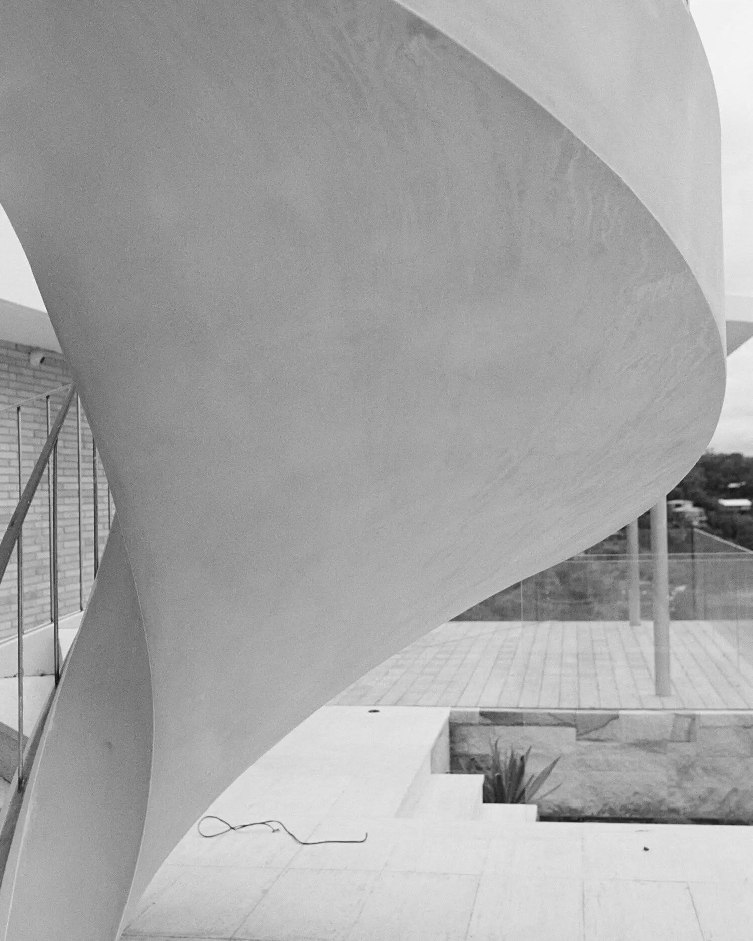 Sculptural spiral staircase in an FS Hough home